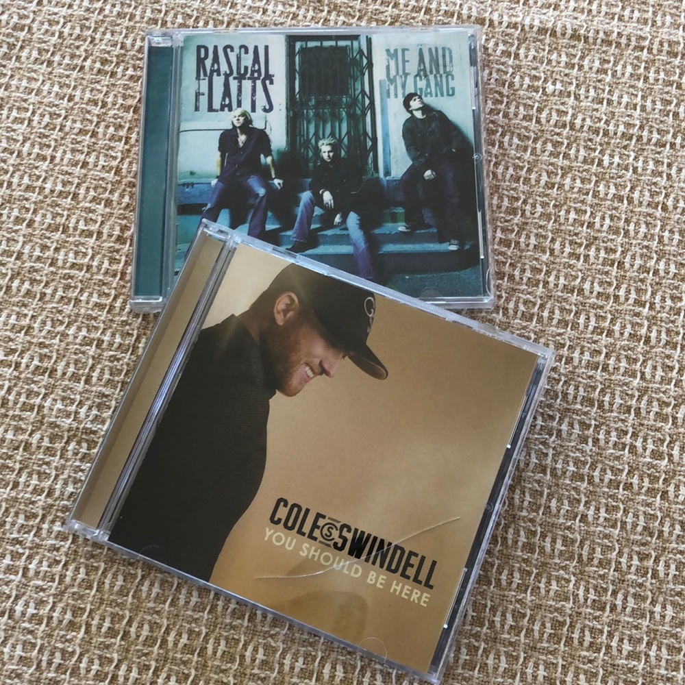 2 Country music CDs Rascal Flatts and Cole Swindell